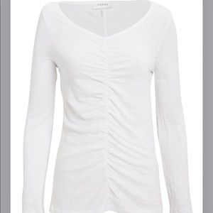 Frame shirred long sleeve linen top